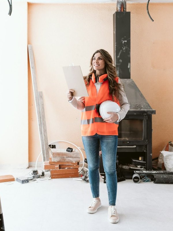 professional confident architect woman in construction site. Home renovation