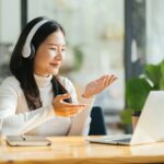 Beautiful woman wearing headsets worker call centre. working customer support service operator.